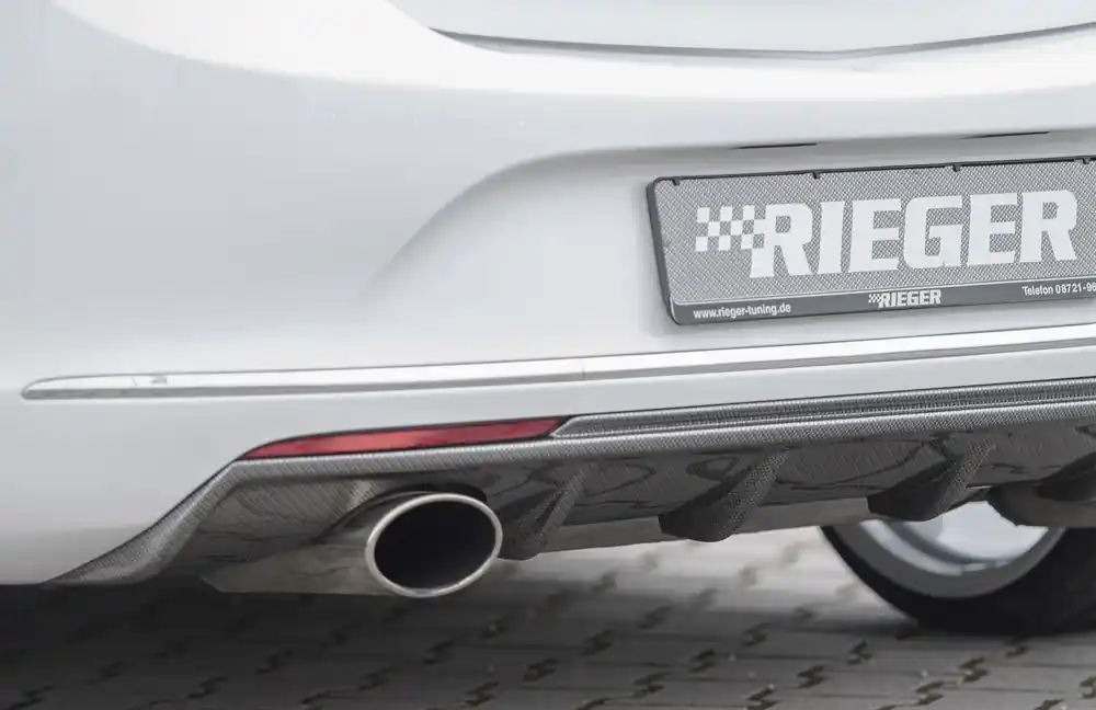 Aktuální Rieger vložka zadního nárazníku pro Opel Astra J 5-dvéř., hatchback po faceliftu, plast ABS s povrchovou úpravou Carbon-Look, pro sportovní koncovku vlevo 140x90 mm