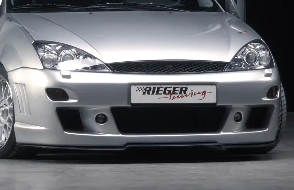 Rieger Přední nárazník pro Ford Focus 1 3-dvéř., 5-dvéř., plast ABS bez povrchové úpravy, s žebrováním, s výřezy pro blinkry, pro vozy s ostřikovači světlometů Zlevněný